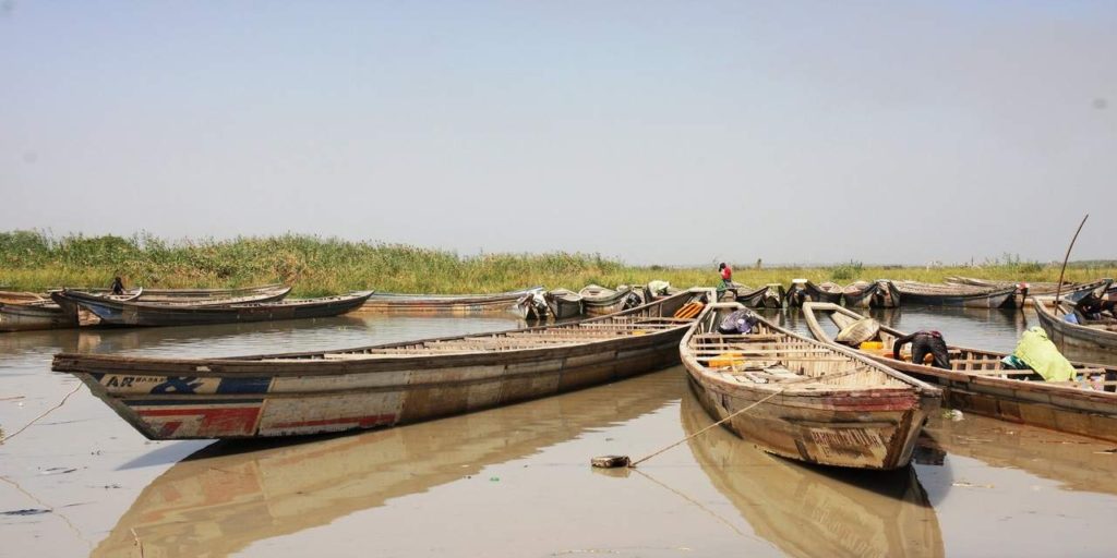 Nigerian migrating on small boats