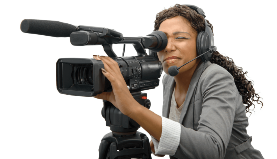 young black women with professional video camera